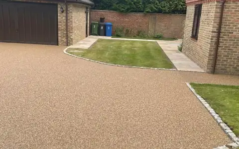 Resin bound driveway in front of a detached garage