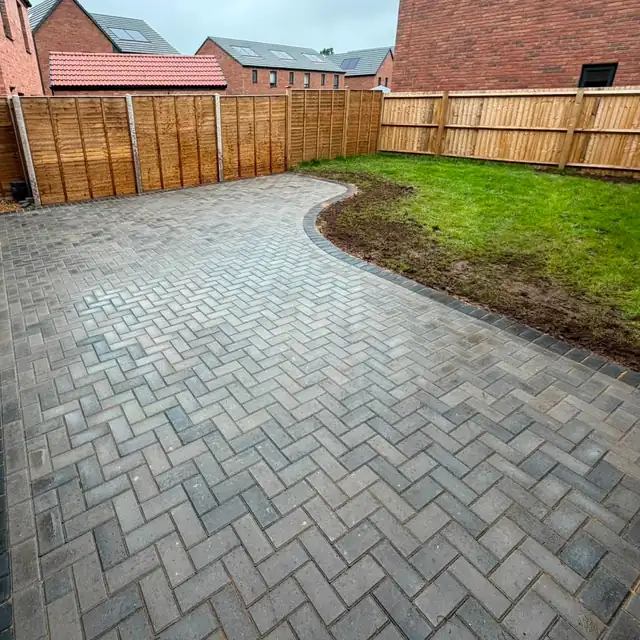 Charcoal herringbone block paving, shown large