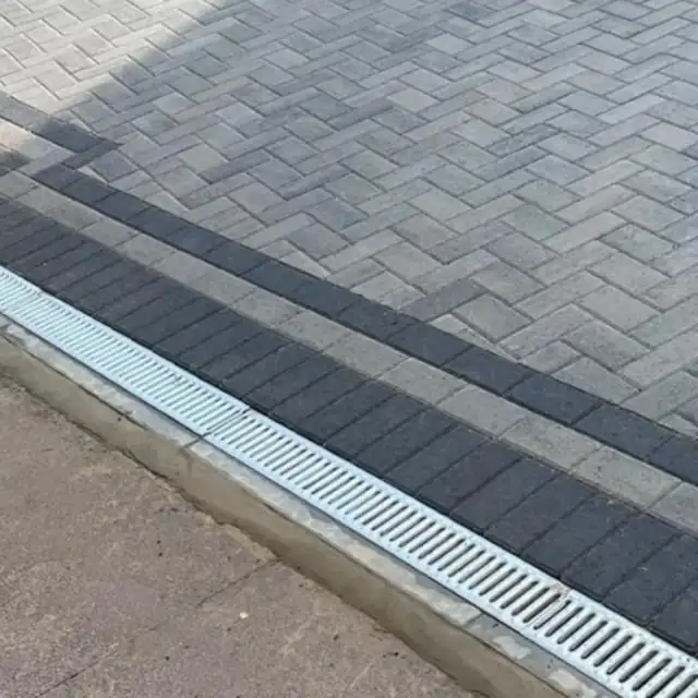 Grey block paving with a charcoal border