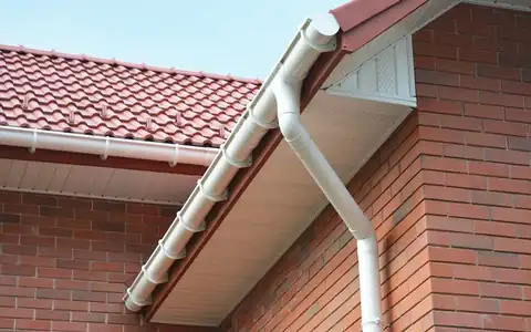White fascias and soffits under a red tiled roof